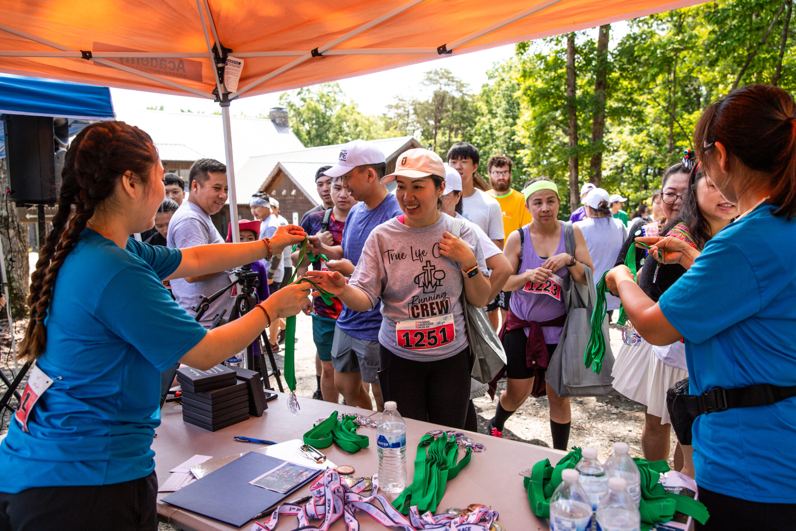 Volunteers giving out metals